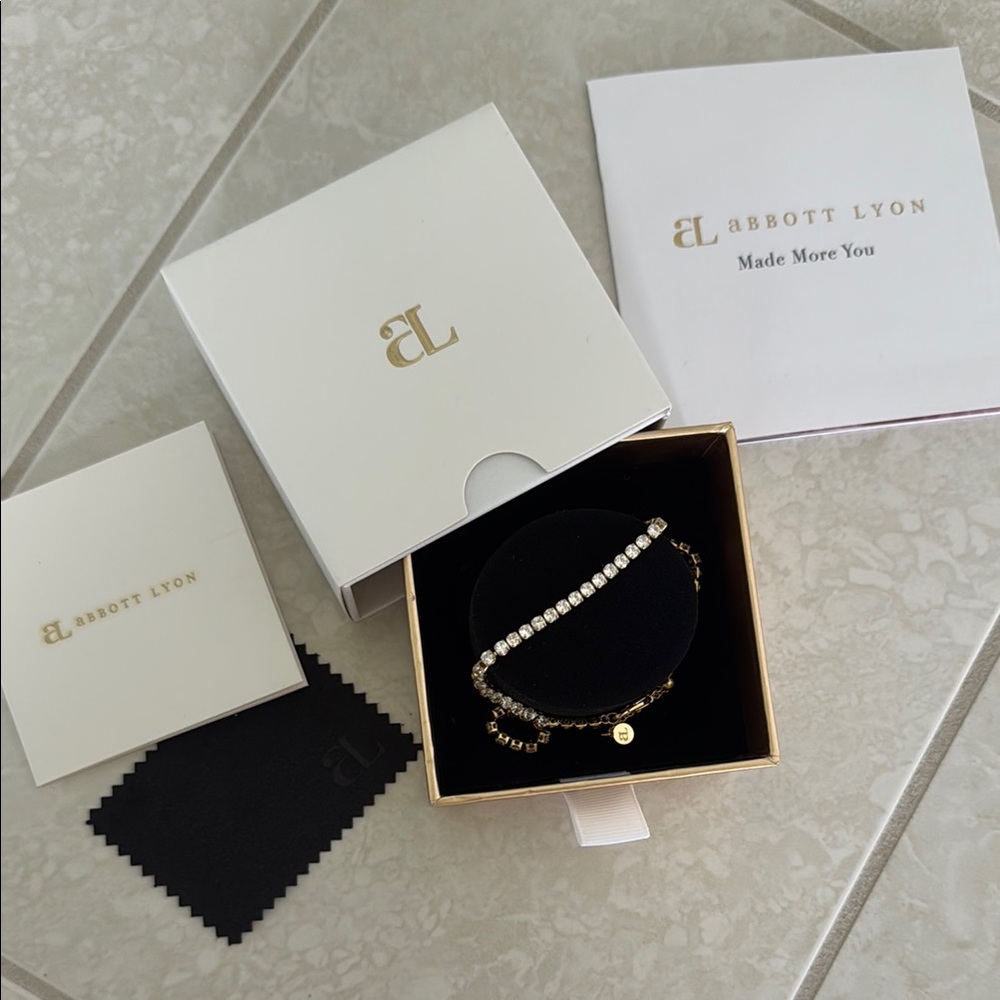 Gold and Silver Linear Design Bracelet with Crystals